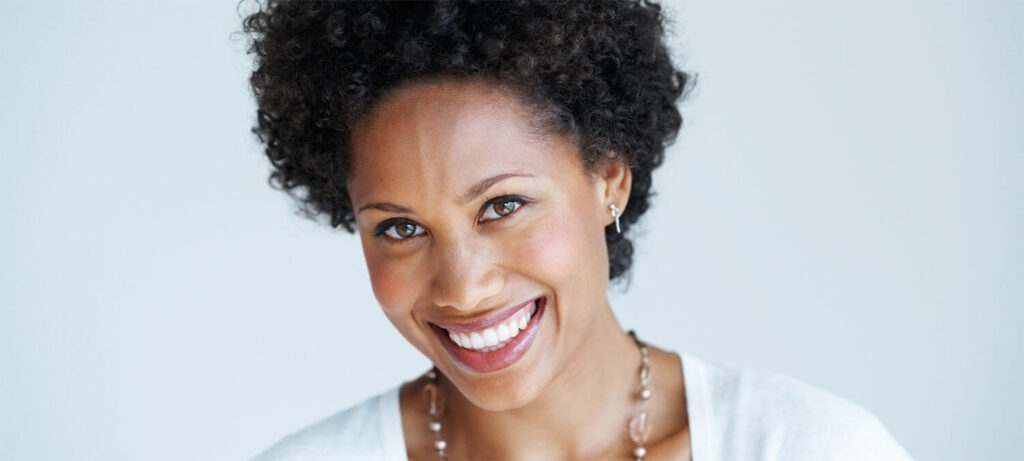 Woman with a healthy teeth smiling