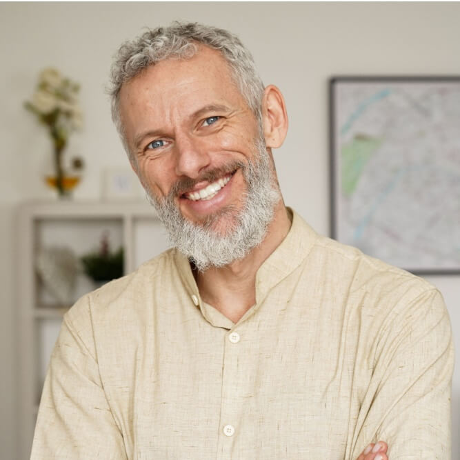 Smiling relaxed mature older man