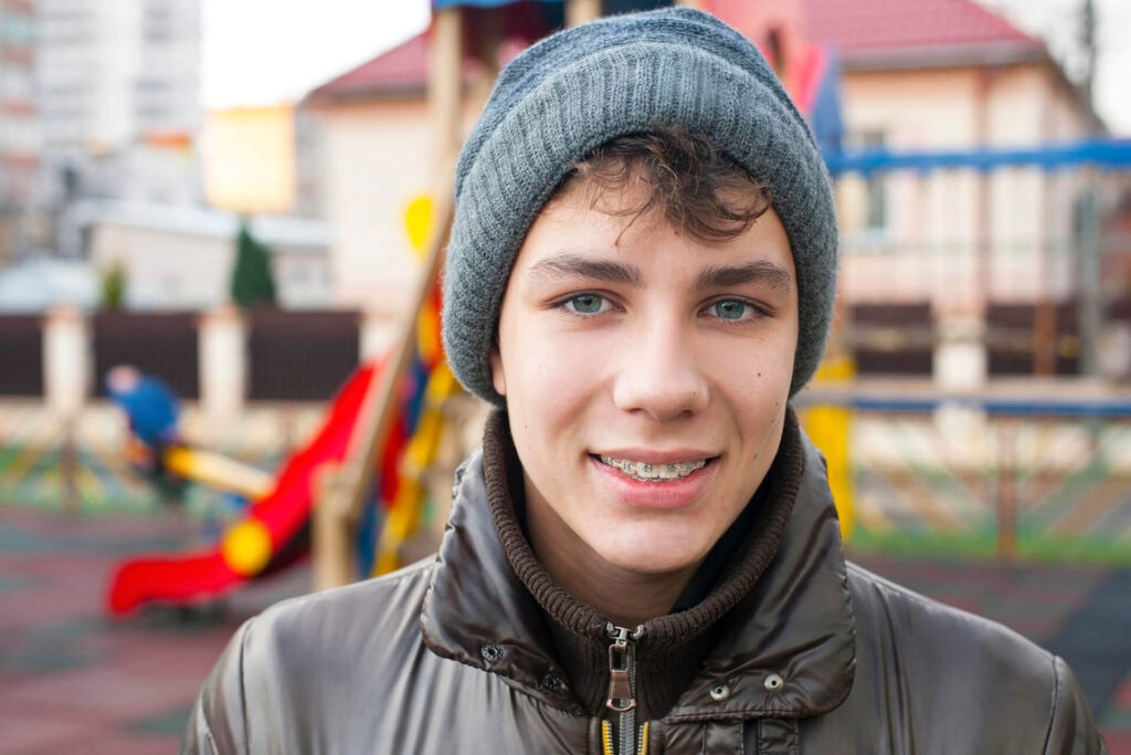 A teenager near the children's playground