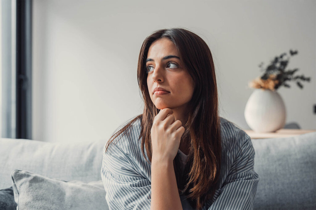 Sad woman sit alone thinking