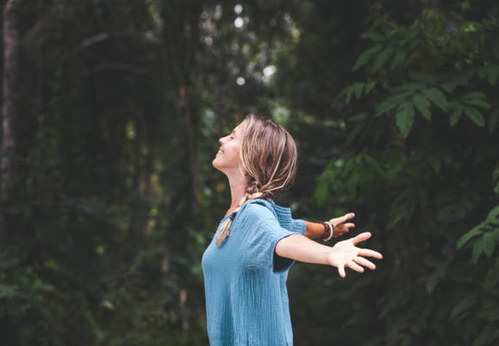 Young woman relaxing and enjoying nature