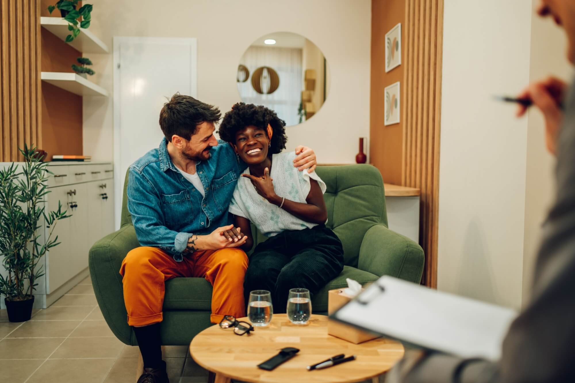 Smiling diverse couple trying to solve some issues