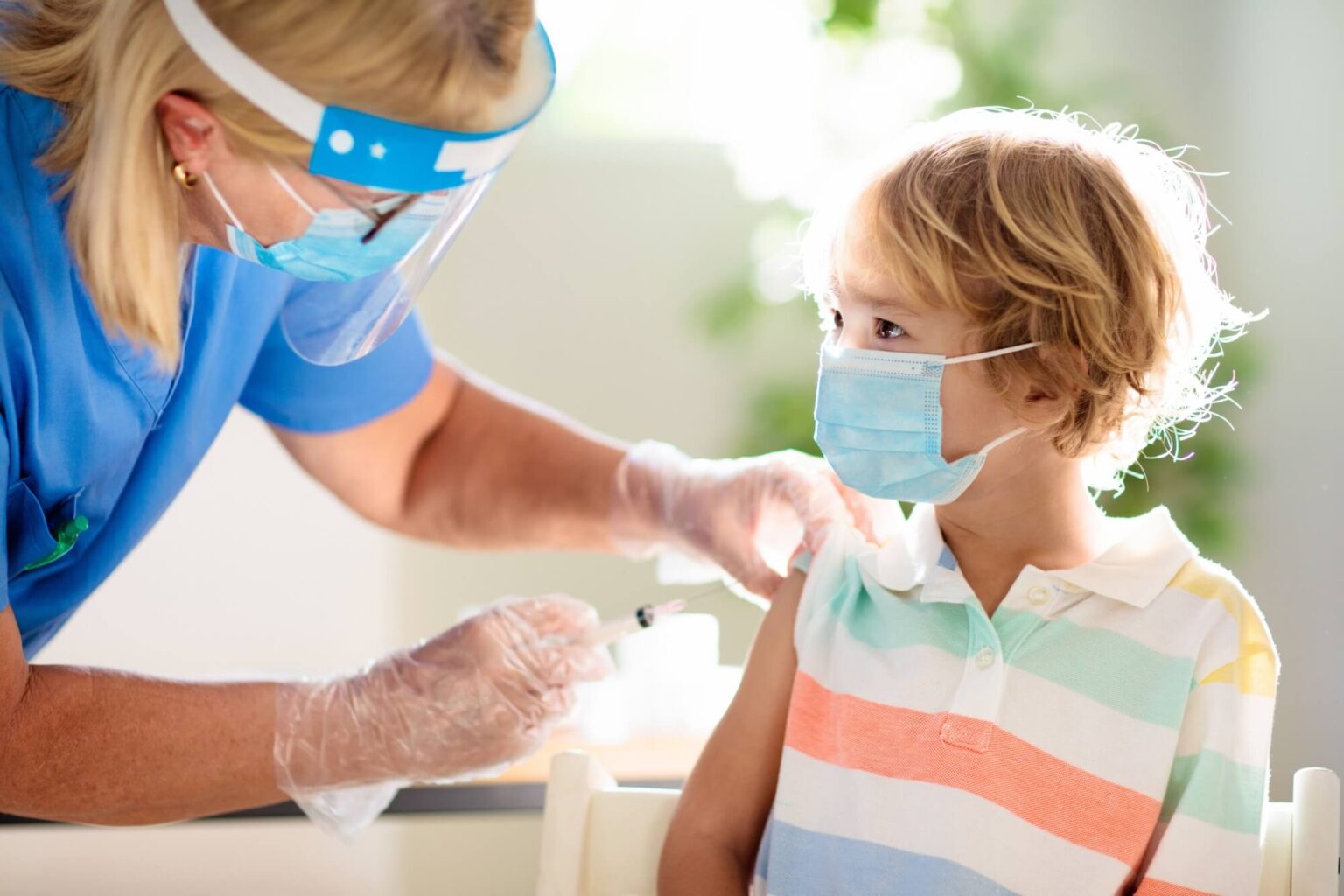 Little boy getting vaccination