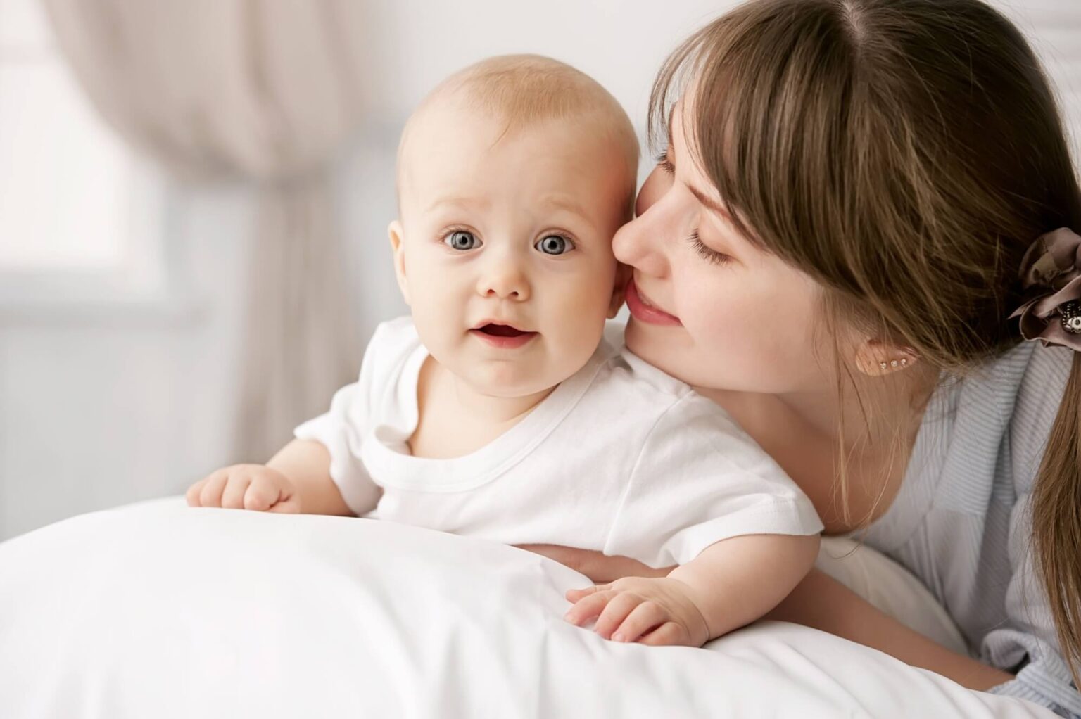 Happy child near to mum in her room