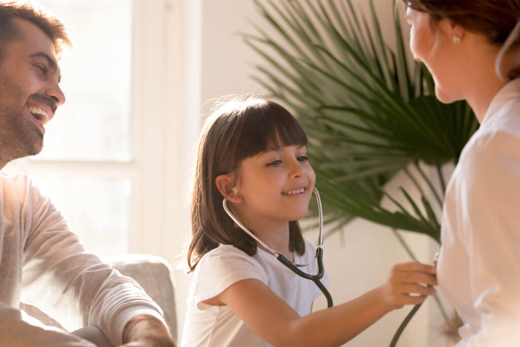 Cute little girl playing as doctor