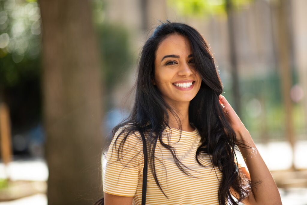 Happy young Arabic woman smiling