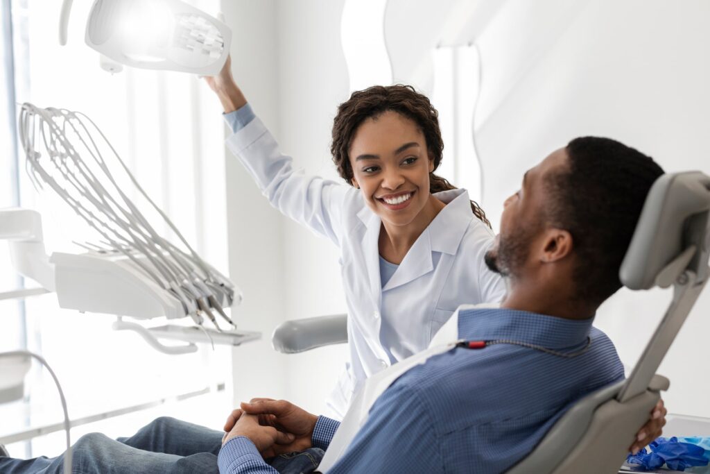 dentist greeting male patient