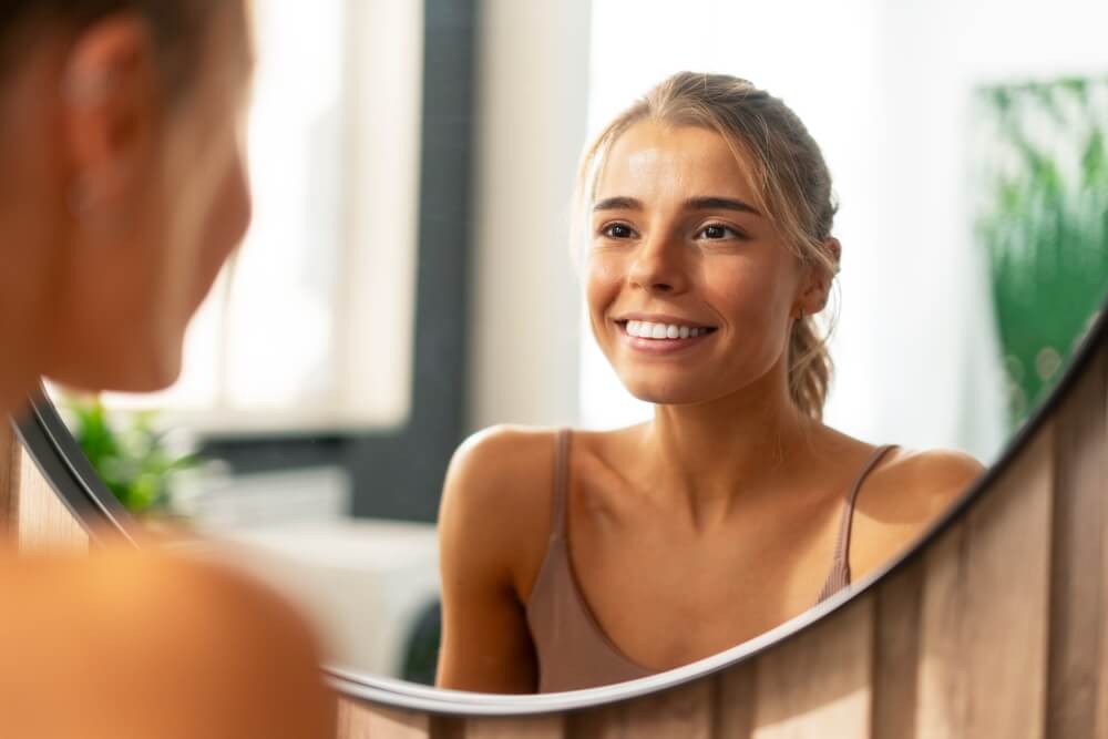 Smiling beautiful confident woman with perfect makeup