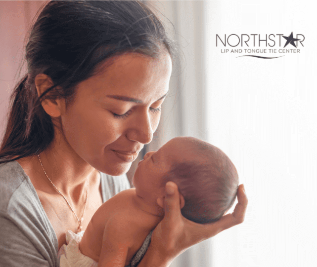 Mom holding her new born for care