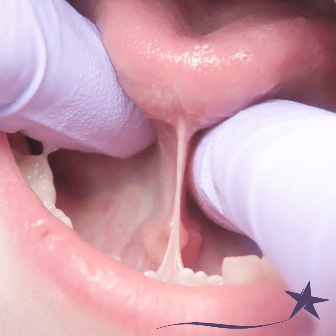 Dentist examining patients tongue