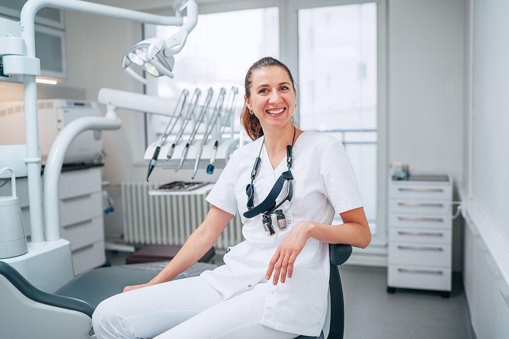 smiling young dentist woman