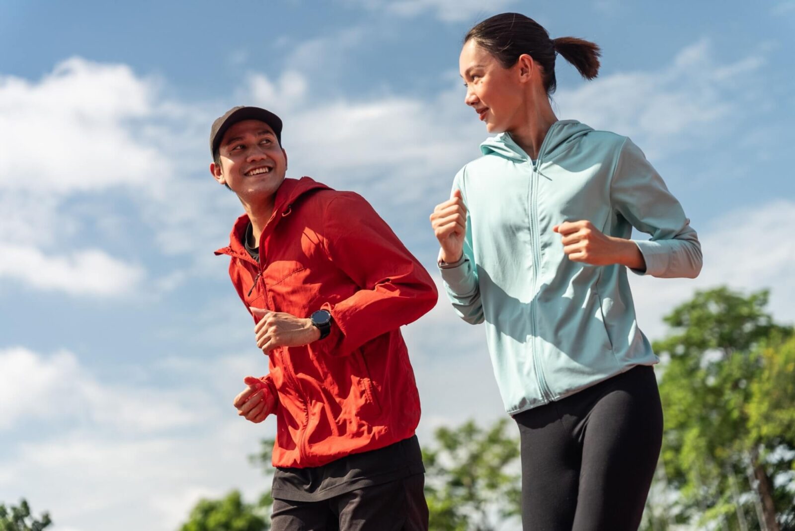 Young couple are exercising with outdoor running