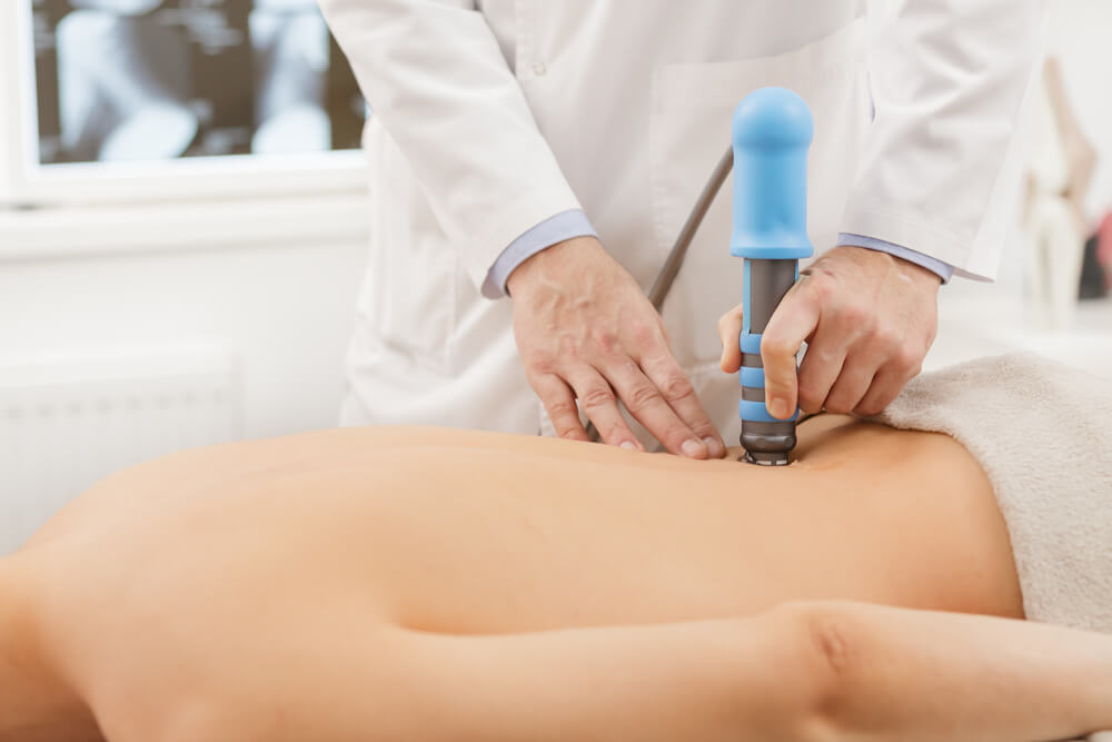 Physical therapy for lower back with shock waves