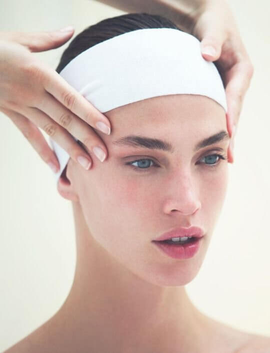 Young woman with head band