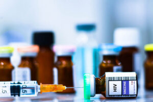 Vaccine bottles and syringes for injection preventing HIV