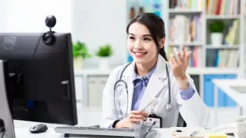 Female doctor listening to patient talking symptom on the internet by webcam