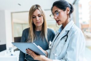 provider with patient discussing treatment