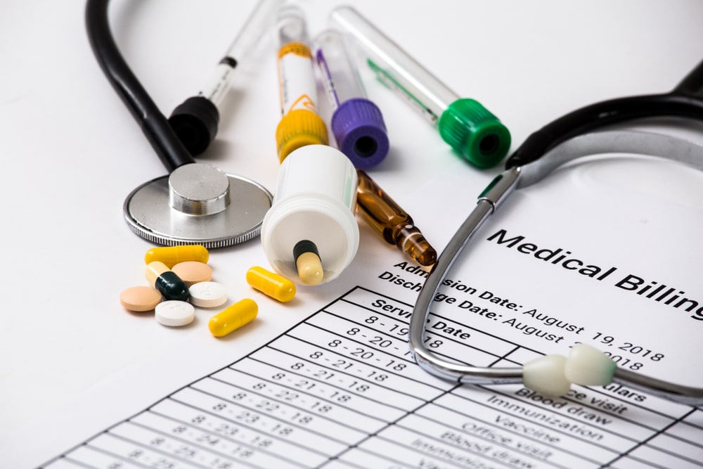 Health care costs. Stethoscope and calculator symbol for health care costs or medical insurance
