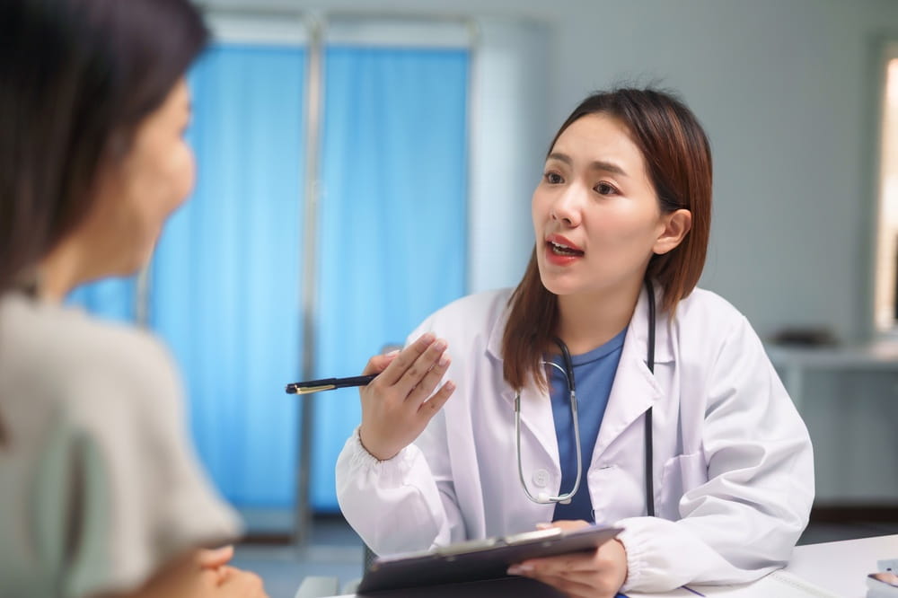 https://www.shutterstock.com/image-photo/young-female-doctor-consulting-patient-discussing-2722163433?trackingId=7e332960-3569-48f0-9074-6d6d0fe29900&listId=searchResults