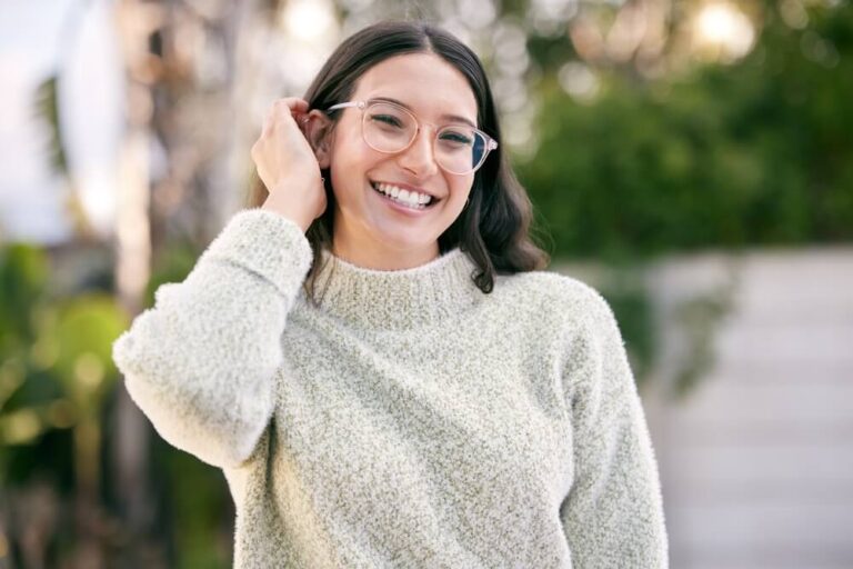 Woman wearing glasses smiling