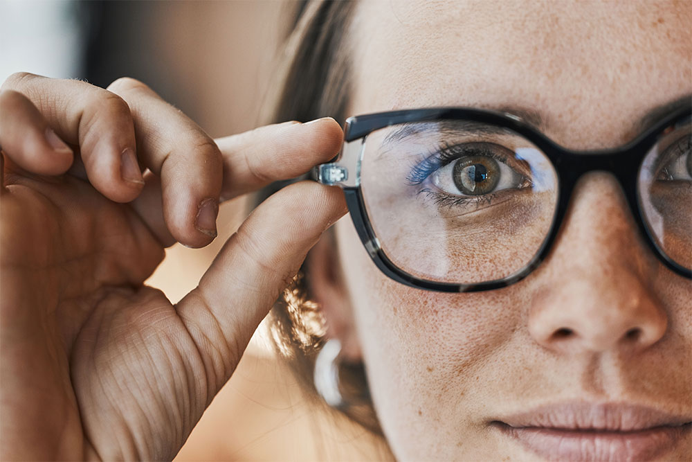 woman with glasses for optical healthcare