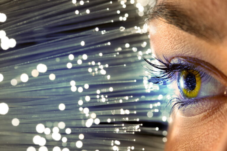 Close up of woman eye in process of scanning