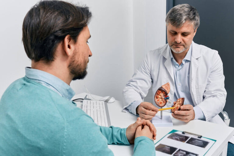 Adult man during consultation with experienced urologist