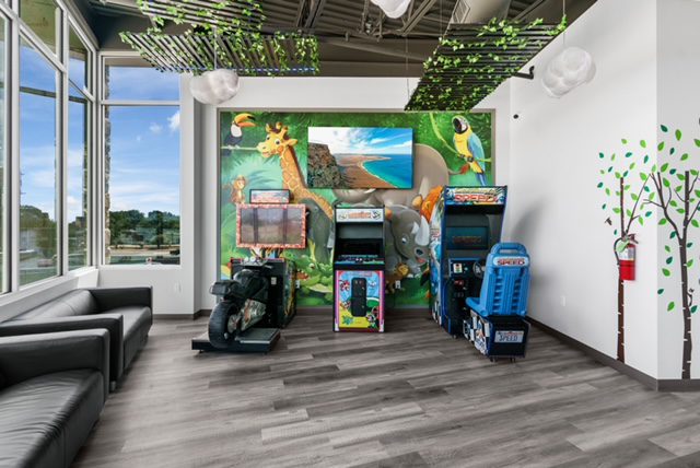 Office waiting area with games