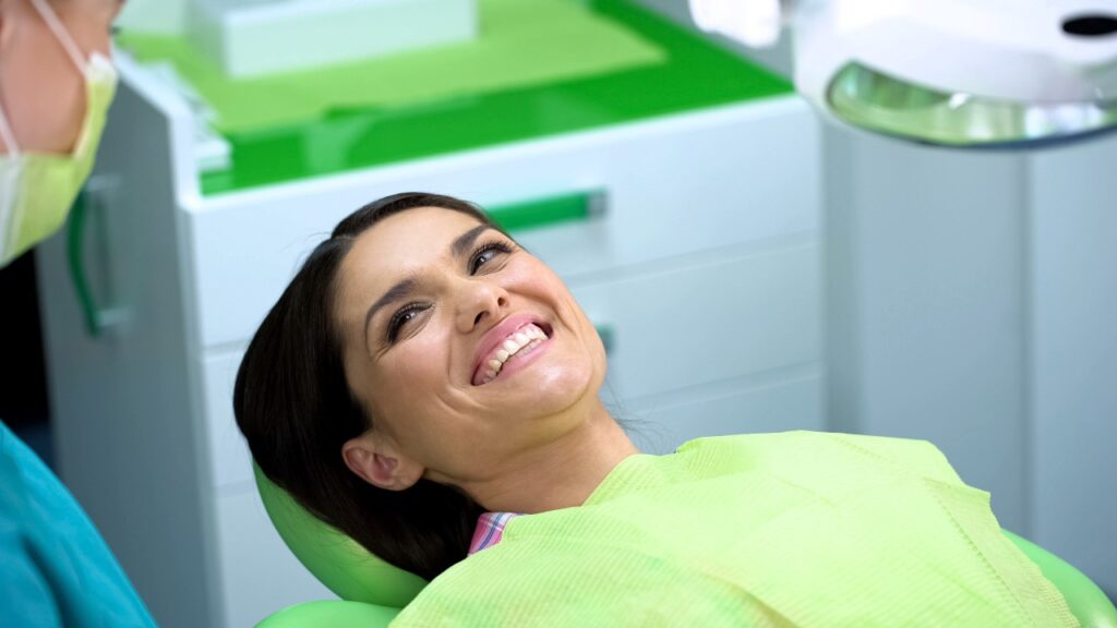 Happy lady laughing at dentistry