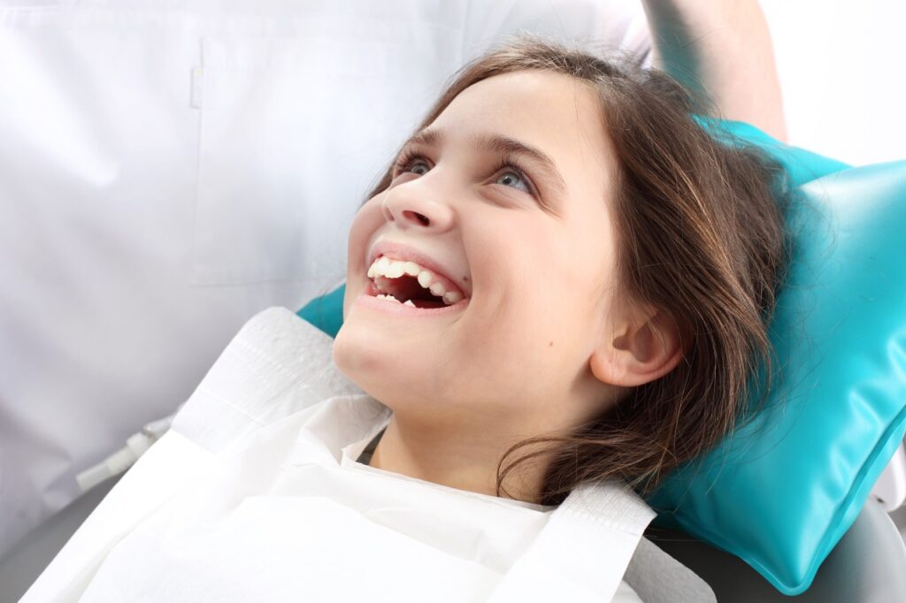 child in the dental chair.