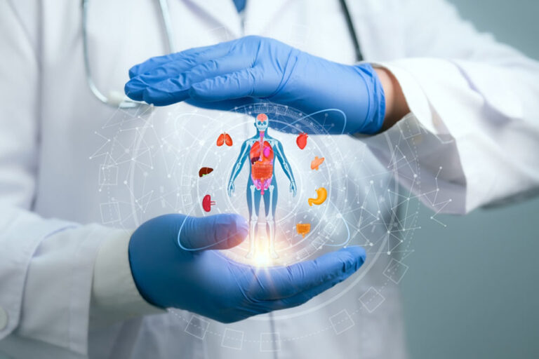 Medical worker holding hologram of a human body with human organs