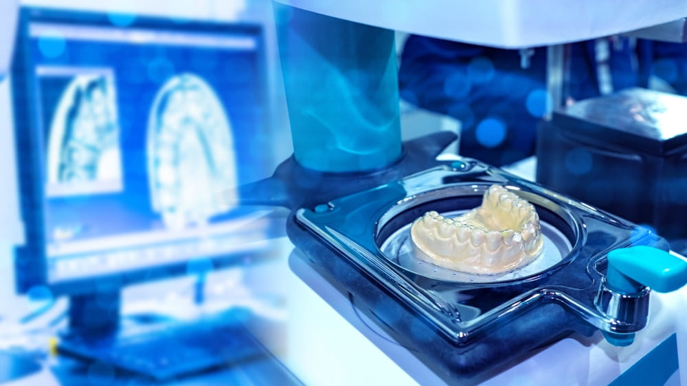 Milling dental system with computer control. Grinding and milling machine of dentures.