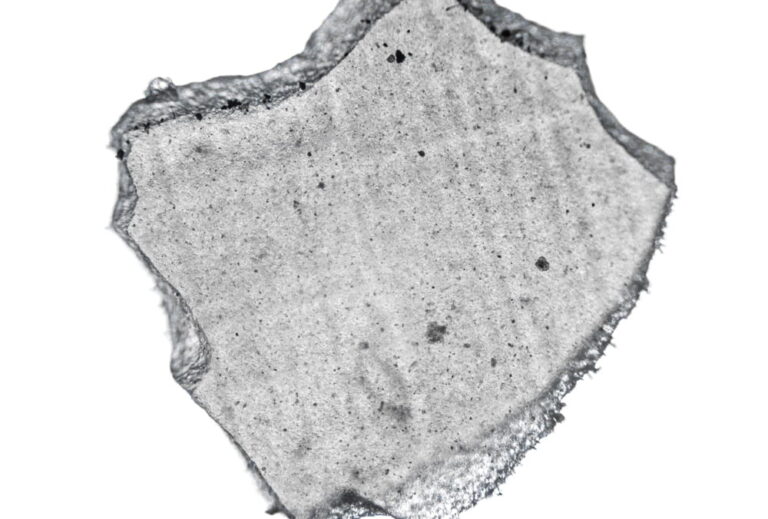 fragment of hybrid ceramic used in dentistry, macro photo using a microscope, magnification 40 times