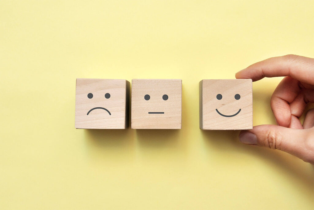 Emotions on Choosing a positive wooden blocks