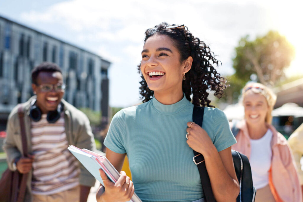 Girl with friends at university for learning