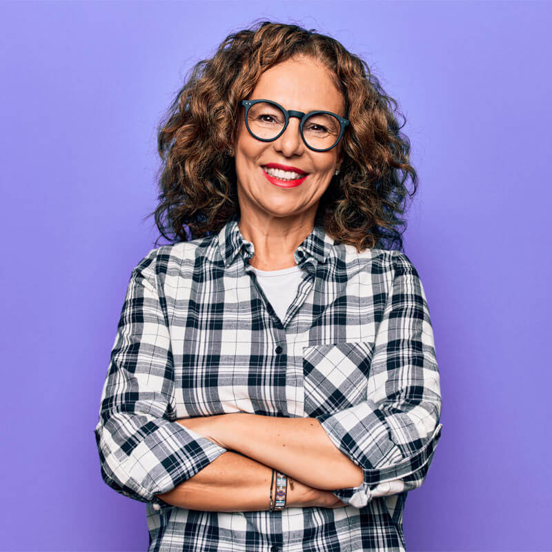Middle age beautiful woman wearing casual shirt and glasses