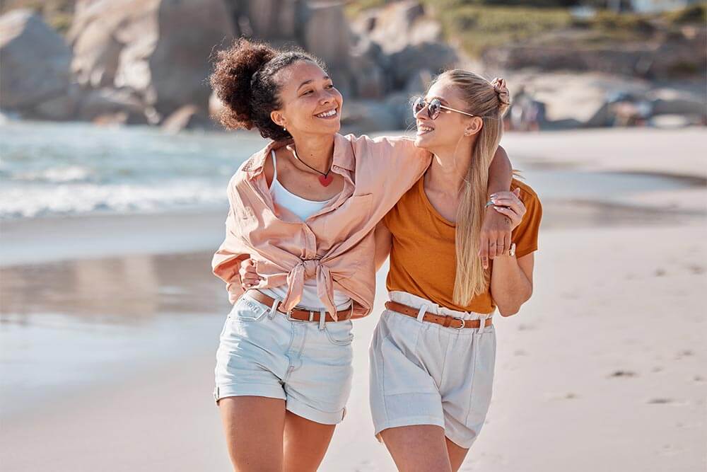 Couple on beach enjoying sunny day