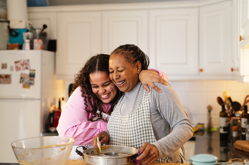 Happy,African,Mother,And,Daughter,Preparing,A,Homemade,Dessert