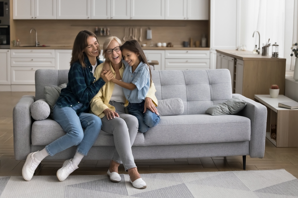 Happy,Sweet,Kid,Girl,And,Young,Mom,Hugging,Cheerful,Grandma