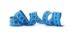 Curled blue measuring tape