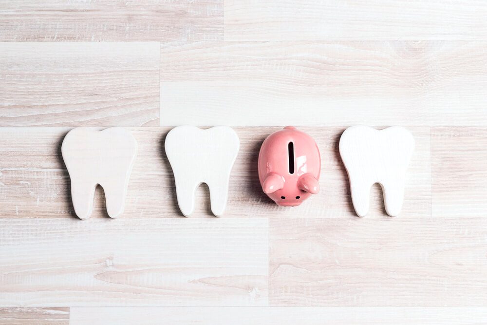 Pink piggy bank with teeth