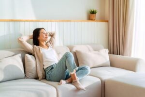 woman sitting on couch