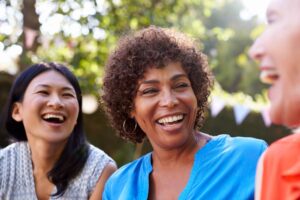 Older women smiling, friends