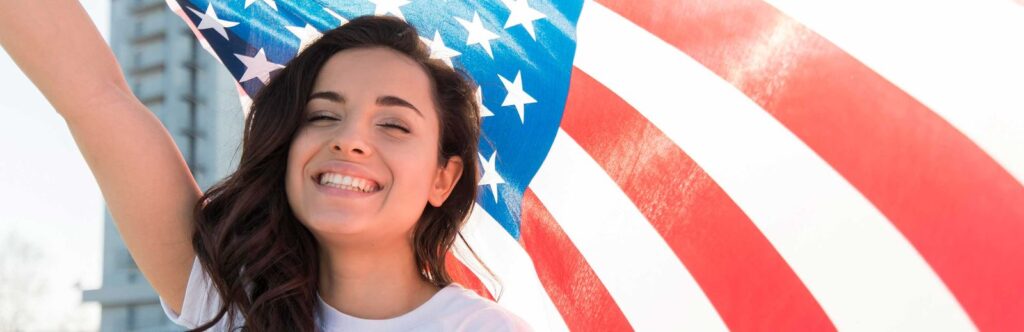 Beautiful girl with a US flag