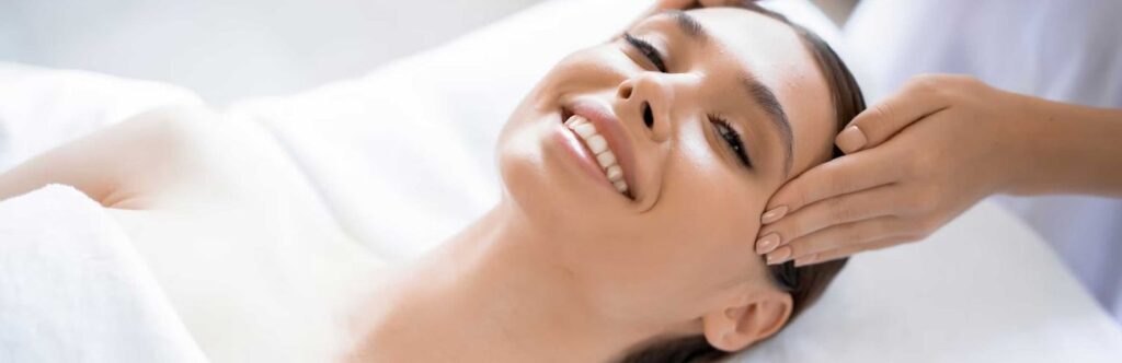 Beautiful woman in massage salon