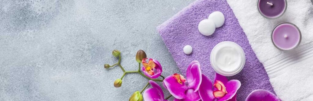 Spa setting of towel and flower