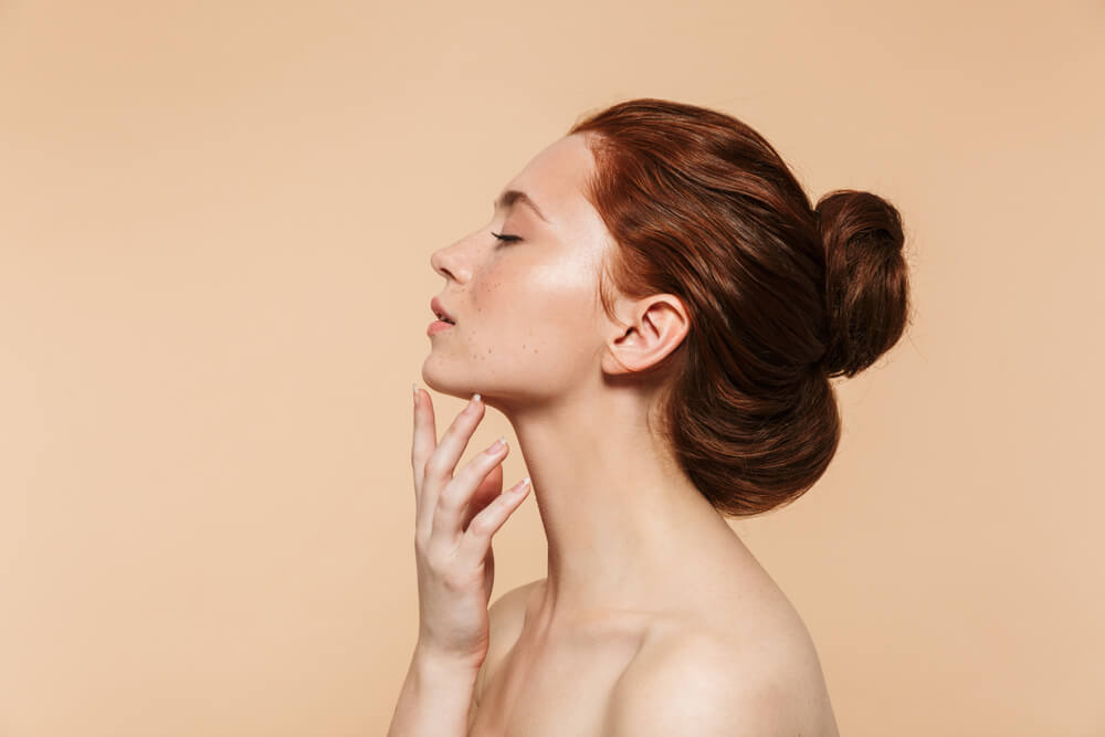 Pretty young redhead woman