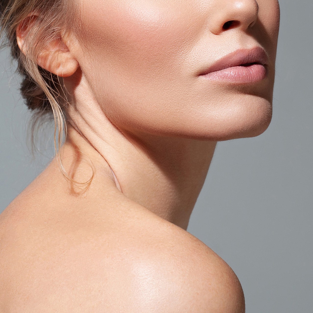 beautiful woman on gray background