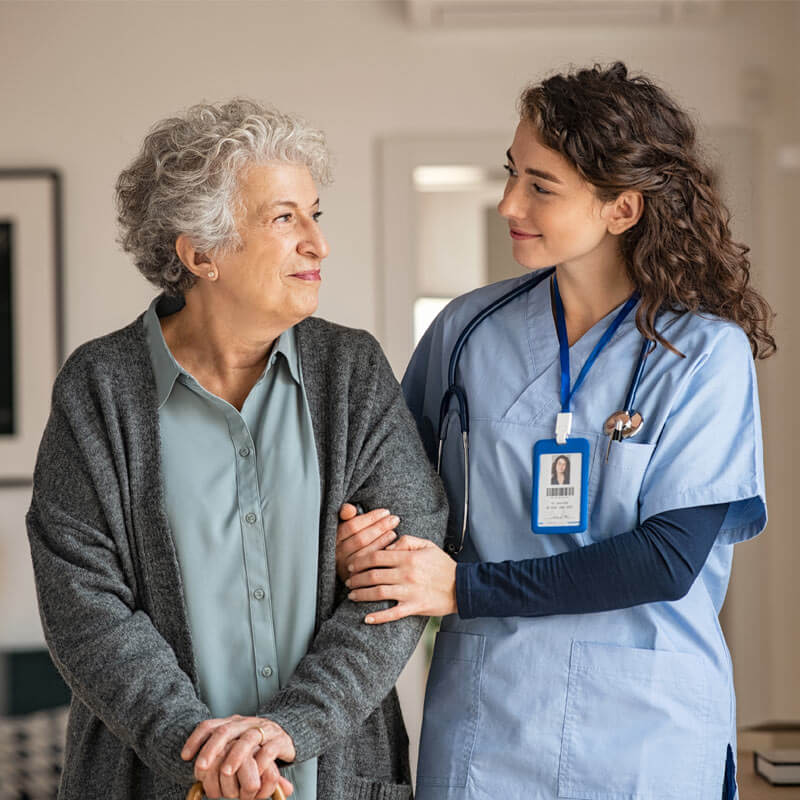 nurse with old patient
