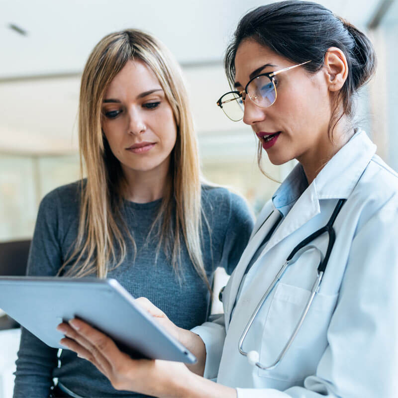 female doctor talking to her patient